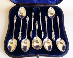 Cased Victorian silver gilt apostle tea spoons with caddy spoon and tongs
