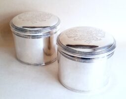 Pair of silver pots Pair of George III silver boxes pots