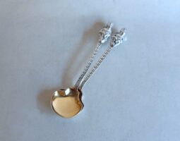 Pair of silver salt spoons with angel finials