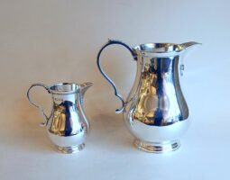 Pauir of silver sparrowbeak jugs