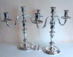 Pair of cast silver candelabra
