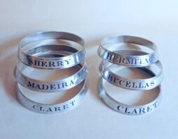 6 George III silver neck ring wine collars